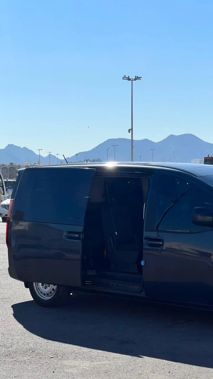Taxi Bhai private van ready for airport pick-up at Jeddah King Abdulaziz International Airport